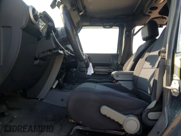 2008 Jeep Wrangler Unlimited Sahara with VIN 1J8GA59108L633332, listed as a Copart auction lot 64613375 with 191,918 mi miles and Clean title. Bid and sale history available at DreamBid. Image 7.