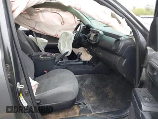 2017 Toyota Tacoma SR with VIN 5TFAX5GN7HX090832, listed as a IAAI auction lot 41903374 with 234,499 mi miles. Bid and sale history available at carsss.com. Image 5.