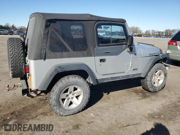 2003 Jeep Wrangler Rubicon z VIN 1J4FA69SX3P301962, wystawiony jako Copart lot #79928744 z przebiegiem Nie podano mil oraz Czysty tytuł • Clean title. Historia ofert i sprzedaży dostępna na DreamBid. Obrazek 3.