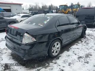 2012 Ford Fusion SE z VIN 3FAHP0HG2CR323380, wystawiony jako IAAI lot #41543660 z przebiegiem 169 059 mil mil oraz . Historia ofert i sprzedaży dostępna na DreamBid. Obrazek 4.