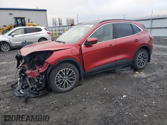 2022 Ford Escape Titanium Plug-In Hybrid z VIN 1FMCU0LZ2NUA23870, wystawiony jako Copart lot #84024854 z przebiegiem 27 759 mil mil oraz Szkoda całkowita • Salvage title. Historia ofert i sprzedaży dostępna na DreamBid. Obrazek 1.