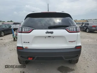 2022 Jeep Cherokee Trailhawk z VIN 1C4PJMBX2ND548837, wystawiony jako Copart lot #59042215 z przebiegiem 13 489 mil mil oraz Szkoda całkowita • Salvage title. Historia ofert i sprzedaży dostępna na DreamBid. Obrazek 6.