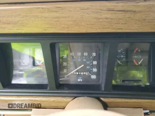 1987 Jeep Grand Wagoneer with VIN 1JCNJ15U7HT006097, listed as a Copart auction lot 89191925 with 119,168 mi miles and Salvage title. Bid and sale history available at DreamBid. Image 9.