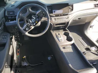 2021 Honda Passport EX-L z VIN 5FNYF8H56MB038792, wystawiony jako Copart lot #52552585 z przebiegiem 16 000 mil mil oraz Nie do naprawy. Historia ofert i sprzedaży dostępna na DreamBid. Obrazek 8.