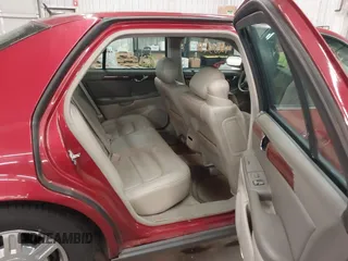 2005 Cadillac DeVille z VIN 1G6KD57Y85U107418, wystawiony jako IAAI lot #42352987 z przebiegiem 160 974 mil mil oraz . Historia ofert i sprzedaży dostępna na DreamBid. Obrazek 8.