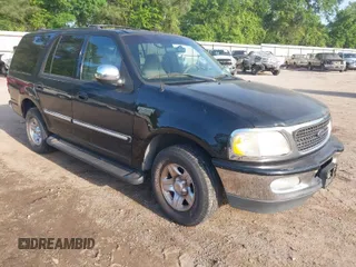 1998 Ford Expedition XLT with VIN 1FMRU1766WLC31063, listed as a IAAI auction lot 41959189 with 168,690 mi miles. Bid and sale history available at carsss.com. Image 1.