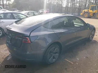 2023 Tesla Model 3 with VIN 5YJ3E1EA6PF567170, listed as a IAAI auction lot 41837040 with 36,193 mi miles and . Bid and sale history available at DreamBid. Image 4.