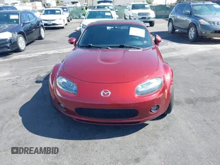 2006 Mazda MX-5 Miata Sport z VIN JM1NC25F260109008, wystawiony jako IAAI lot #42467176 z przebiegiem 139 839 mil mil oraz . Historia ofert i sprzedaży dostępna na DreamBid. Obrazek 6.