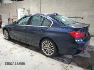 2013 BMW 3 Series 328i xDrive with VIN WBA3B3C57DF537268, listed as a Copart auction lot 57885985 with 122,050 mi miles and Salvage title. Bid and sale history available at DreamBid. Image 2.