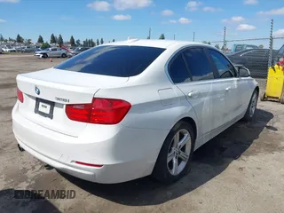 2015 BMW 3 Series 328i with VIN WBA3C1C5XFK117788, listed as a IAAI auction lot 41752178 with 154,030 mi miles and . Bid and sale history available at carsss.com. Image 4.