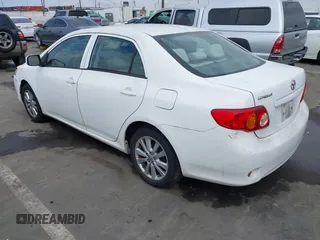 2009 Toyota Corolla with VIN 1NXBU40E99Z082845, listed as a IAAI auction lot 42046564 with 180,910 mi miles. Bid and sale history available at carsss.com. Image 3.