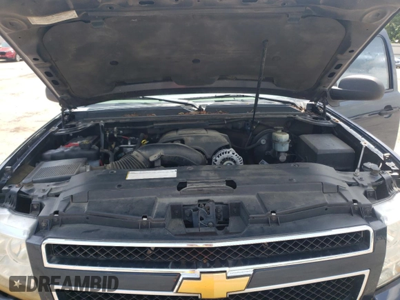 2007 Chevrolet Tahoe LT z VIN 1GNFC13JX7R114712, wystawiony jako Copart lot #62892205 z przebiegiem 295 890 mil mil oraz Szkoda całkowita • Salvage title. Historia ofert i sprzedaży dostępna na DreamBid. Obrazek 12.