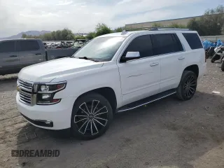 2018 Chevrolet Tahoe Premier with VIN 1GNSKCKC6JR195246, listed as a Copart auction lot 54887165 with 135,973 mi miles and Salvage title. Bid and sale history available at DreamBid. Image 1.