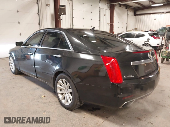 2014 Cadillac CTS Luxury AWD with VIN 1G6AX5S36E0173682, listed as a IAAI auction lot 41538709 with 102,772 mi miles and . Bid and sale history available at DreamBid. Image 3.