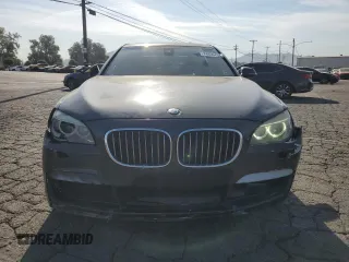2014 BMW 7 Series 740Li with VIN WBAYE4C56ED138044, listed as a Copart auction lot 74859434 with 110,209 mi miles and Clean Title. Bid and sale history available at carsss.com. Image 5.