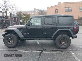 2022 Jeep Wrangler Unlimited Rubicon with VIN 1C4HJXFGXNW127064, listed as a IAAI auction lot 41491203 with 47,700 mi miles and . Bid and sale history available at DreamBid. Image 14.
