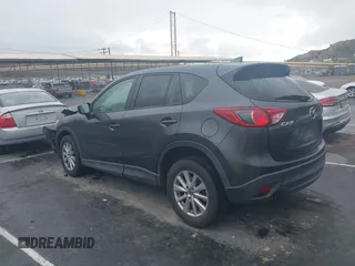 2016 Mazda CX-5 Touring with VIN JM3KE2CY7G0630056, listed as a IAAI auction lot 41817525 with 97,844 mi miles and . Bid and sale history available at DreamBid. Image 3.