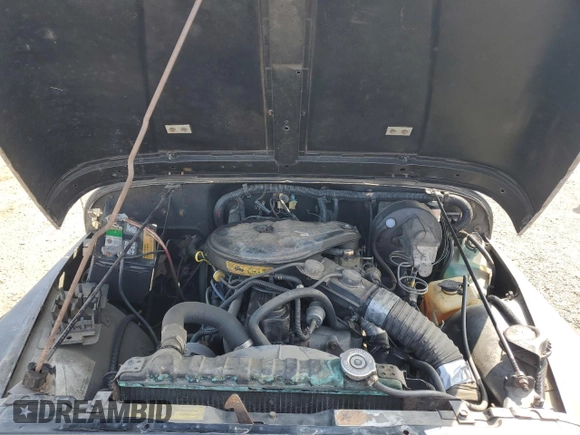 1990 Jeep Wrangler with VIN 2J4FY29T8LJ541585, listed as a Copart auction lot 54352634 with 138,022 mi miles and Salvage Title. Bid and sale history available at carsss.com. Image 13.