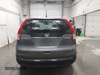 2013 Honda CR-V EX with VIN 2HKRM4H59DH682484, listed as a IAAI auction lot 41504589 with 208,260 mi miles and . Bid and sale history available at DreamBid. Image 16.