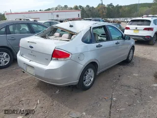 2009 Ford Focus SE with VIN 1FAHP35N49W148334, listed as a IAAI auction lot 41887678 with 73,630 mi miles. Bid and sale history available at carsss.com. Image 4.