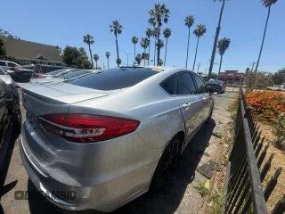 2019 Ford Fusion SE z VIN 3FA6P0HD0KR201807, wystawiony jako Copart lot #58443565 z przebiegiem 30 077 mil mil oraz Szkody całkowita. Historia ofert i sprzedaży dostępna na DreamBid. Obrazek 4.