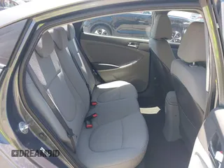 2013 Hyundai Accent GLS z VIN KMHCU4AE9DU427450, wystawiony jako IAAI lot #42415750 z przebiegiem 105 890 mil mil oraz . Historia ofert i sprzedaży dostępna na DreamBid. Obrazek 8.
