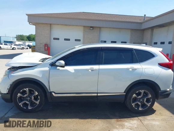 2018 Honda CR-V Touring with VIN 2HKRW2H92JH662753, listed as a IAAI auction lot 39538586 with 83,202 mi miles. Bid and sale history available at carsss.com. Image 15.