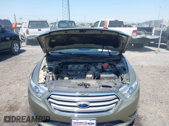 2013 Ford Taurus SEL with VIN 1FAHP2E88DG105557, listed as a IAAI auction lot 42040773 with 157,705 mi miles and . Bid and sale history available at carsss.com. Image 10.