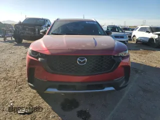 2023 Mazda CX-50 Premium z VIN 7MMVABDY5PN127077, wystawiony jako Copart lot #82572384 z przebiegiem 34 977 mil mil oraz Szkoda całkowita • Salvage title. Historia ofert i sprzedaży dostępna na DreamBid. Obrazek 5.