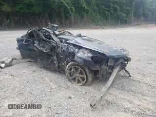2004 Cadillac CTS-V with VIN 1G6DN57S940153332, listed as a Copart auction lot 61662674 with 0 mi miles and Salvage Title. Bid and sale history available at carsss.com. Image 4.