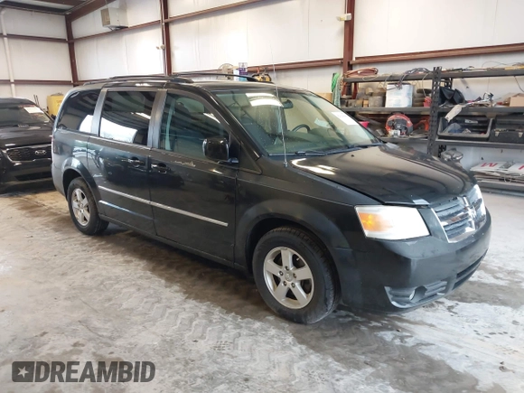 2010 Dodge Grand Caravan SXT with VIN 2D4RN5D19AR433481, listed as a IAAI auction lot 42123049 with 134,882 mi miles and . Bid and sale history available at DreamBid. Image 1.