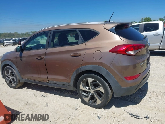 2016 Hyundai Tucson Sport with VIN KM8J33A29GU054909, listed as a IAAI auction lot 41835688 with 90,751 mi miles. Bid and sale history available at carsss.com. Image 14.