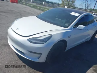 2019 Tesla Model 3 Mid Range with VIN 5YJ3E1EA7KF425127, listed as a IAAI auction lot 41886436 with 87,236 mi miles and . Bid and sale history available at carsss.com. Image 17.
