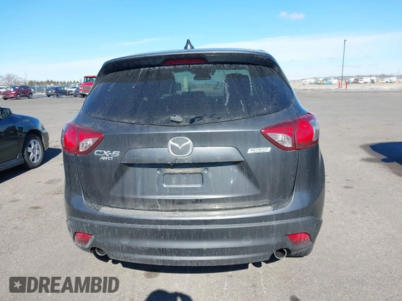 2014 Mazda CX-5 Grand Touring with VIN JM3KE4DY1E0364685, listed as a IAAI auction lot 41665349 with 135,751 mi miles. Bid and sale history available at carsss.com. Image 16.