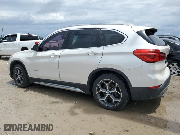 2016 BMW X1 xDrive28i with VIN WBXHT3C34GP887401, listed as a Copart auction lot 52255655 with 129,599 mi miles and Clean Title. Bid and sale history available at carsss.com. Image 2.