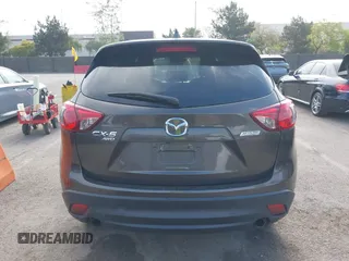 2016 Mazda CX-5 Grand Touring z VIN JM3KE4DY2G0684066, wystawiony jako IAAI lot #42078725 z przebiegiem 200 129 mil mil oraz . Historia ofert i sprzedaży dostępna na DreamBid. Obrazek 16.