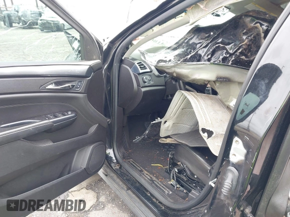 2015 Cadillac SRX with VIN 3GYFNAE36FS573940, listed as a IAAI auction lot 41808779 with Not Provided miles and . Bid and sale history available at DreamBid. Image 5.