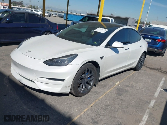 2020 Tesla Model 3 Standard Range Plus with VIN 5YJ3E1EA1LF659765, listed as a IAAI auction lot 41834411 with 42,433 mi miles and . Bid and sale history available at carsss.com. Image 17.