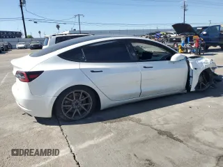 2021 Tesla Model 3 Standard Range Plus with VIN 5YJ3E1EA8MF874156, listed as a Copart auction lot 46323505 with Not Provided miles and Salvage Title. Bid and sale history available at DreamBid. Image 3.