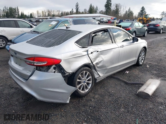 2017 Ford Fusion SE z VIN 3FA6P0HD2HR149699, wystawiony jako IAAI lot #41872383 z przebiegiem 95 587 mil mil oraz . Historia ofert i sprzedaży dostępna na DreamBid. Obrazek 4.