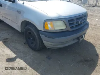 2002 Ford F-150 XL with VIN 1FTRF17202NB42616, listed as a IAAI auction lot 42117616 with 230,852 mi miles. Bid and sale history available at carsss.com. Image 6.