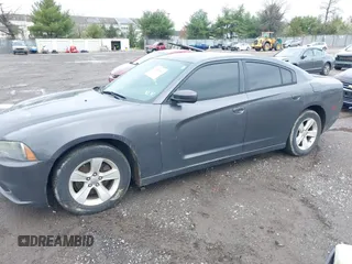 2014 Dodge Charger SE with VIN 2C3CDXBG8EH117241, listed as a IAAI auction lot 41952443 with 158,432 mi miles and . Bid and sale history available at DreamBid. Image 17.