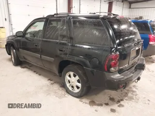 2005 Chevrolet TrailBlazer LT with VIN 1GNDT13S152249874, listed as a IAAI auction lot 42071247 with 165,616 mi miles. Bid and sale history available at carsss.com. Image 3.