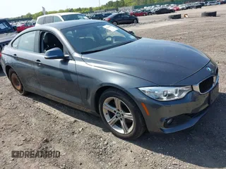 2015 BMW 4 Series 428i xDrive with VIN WBA4C9C55FD331921, listed as a IAAI auction lot 42214901 with 94,970 mi miles and . Bid and sale history available at DreamBid. Image 1.