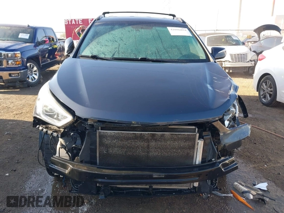 2016 Hyundai Santa Fe z VIN 5XYZUDLB3GG312687, wystawiony jako IAAI lot #42096854 z przebiegiem 162 586 mil mil oraz . Historia ofert i sprzedaży dostępna na DreamBid. Obrazek 13.