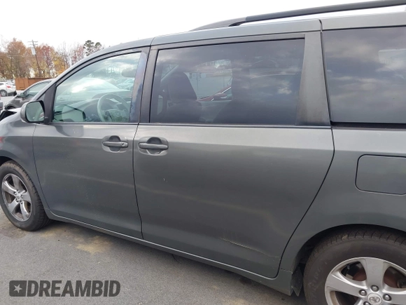 2012 Toyota Sienna LE AAS with VIN 5TDKK3DC5CS253020, listed as a IAAI auction lot 40900034 with 208,421 mi miles. Bid and sale history available at carsss.com. Image 14.