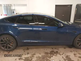 2021 Tesla Model S Plaid with VIN 5YJSA1E6XMF439884, listed as a IAAI auction lot 41622750 with Not provided miles and . Bid and sale history available at DreamBid. Image 13.