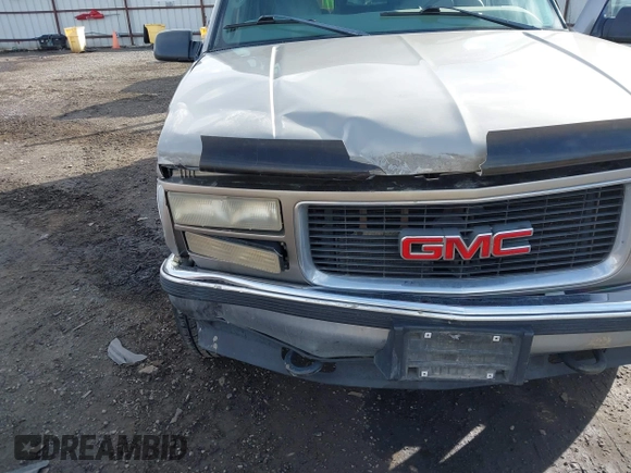 1999 GMC Yukon with VIN 1GKEK13R2XJ712390, listed as a IAAI auction lot 41793649 with 222,721 mi miles. Bid and sale history available at carsss.com. Image 6.