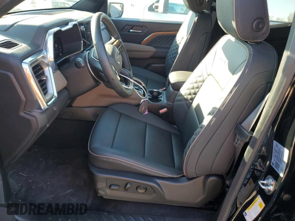 2024 GMC Canyon 4WD Denali with VIN 1GTP6FEK2R1190966, listed as a Copart auction lot 87812495 with 2,143 mi miles and Salvage Title. Bid and sale history available at carsss.com. Image 7.