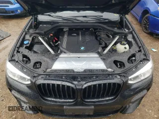 2021 BMW X4 M40i with VIN 5UX2V5C00M9H95699, listed as a Copart auction lot 63564433 with 33,500 mi miles and Salvage title. Bid and sale history available at DreamBid. Image 11.